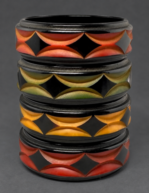 vintage geometric carved overdyed bakelite bangles